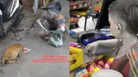 Viral Aksi Bocah 'Silver' Sisihkan Pendapatannya untuk Beri Makan Kucing, Bikin Haru