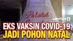 Pemandangan unik tampak di Ibu Kota Rumania Bucharest. Sebuah pohon natal berukuran besar dibuat dari ribuan vial bekas vaksin covid-19 berdiri di Children's Palace.