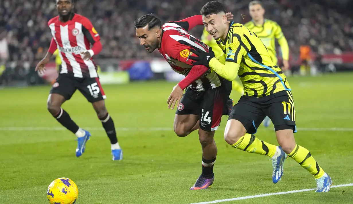 Arsenal pun kini berada di puncak klasemen dengan 30 poin (M9 S3 K1). (AP Photo/Kirsty Wigglesworth)