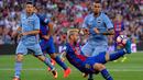  Lionel Messi berhasil mencetak dua gol sekaligus membawa Barcelona meraih kemenangan 3-2 atas Sampdoria pada pertandingan Trofeo Joan Gamper 2016 di Camp Nou, Kamis (11/8/2016) dini hari WIB. (AFP/Josep Lago)