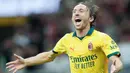 Pemain AC Milan, Luka Modric, melakukan selebrasi setelah mencetak gol ke gawang Bologna dalam giornata ketiga Liga Italia 2025/2026 di Stadion San Siro, Senin (15/9/2025). (AP Photo/Luca Bruno)