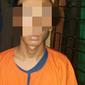 Salah satu remaja penggilir bocah SD ditahan di Polsek Bukitraya Pekanbaru. (Liputan6.com/M Syukur)