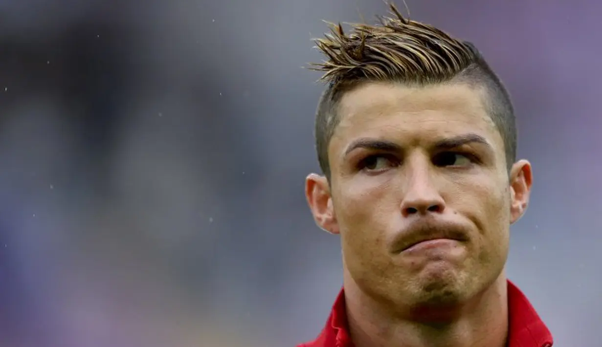 Penampilan baru Cristiano Ronaldo saat memperkuat Portugal melawan Kroasia, 10 Juni 2013. (AFP/Fabrice Coffrini)