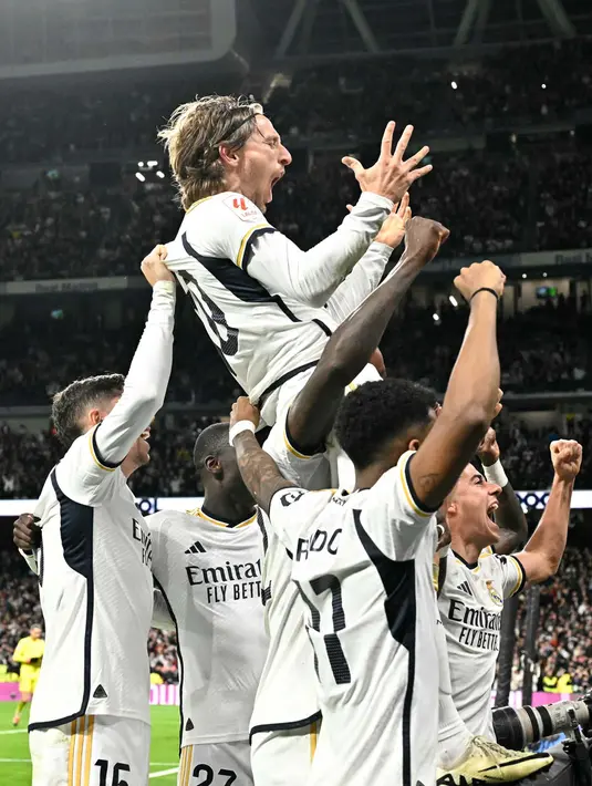 Real Madrid baru bisa memastikan kemenangan lewat gol Luka Modric pada menit ke-81. (JAVIER SORIANO/AFP)