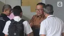 Dirut PTPN IX Iryanto Hutagaol bersiap menjalani pemeriksaan di Gedung KPK, Jakarta, Selasa (12/11/2019). Iryanto diperiksa sebagai saksi untuk tersangka Direktur Pemasaran PTPN III (Persero) I Kadek Kertha Laksana terkait suap pengelolaan distribusi gula di PTPN III 2019. (merdeka.com/Dwi Narwoko)