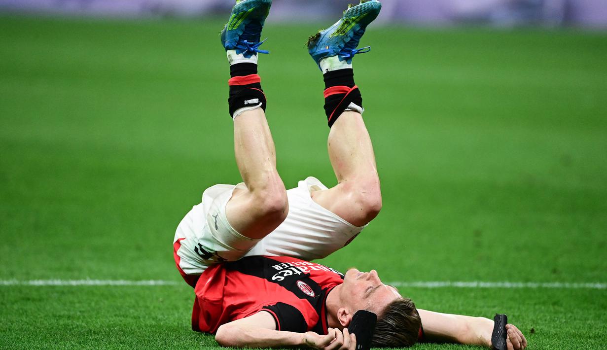 AC Milan mengakhiri kompetisi dengan kekecewaan besar setelah menderita kekalahan tipis 1-2 saat berhadapan dengan Cagliari. (AFP/Piero Cruciatti)
