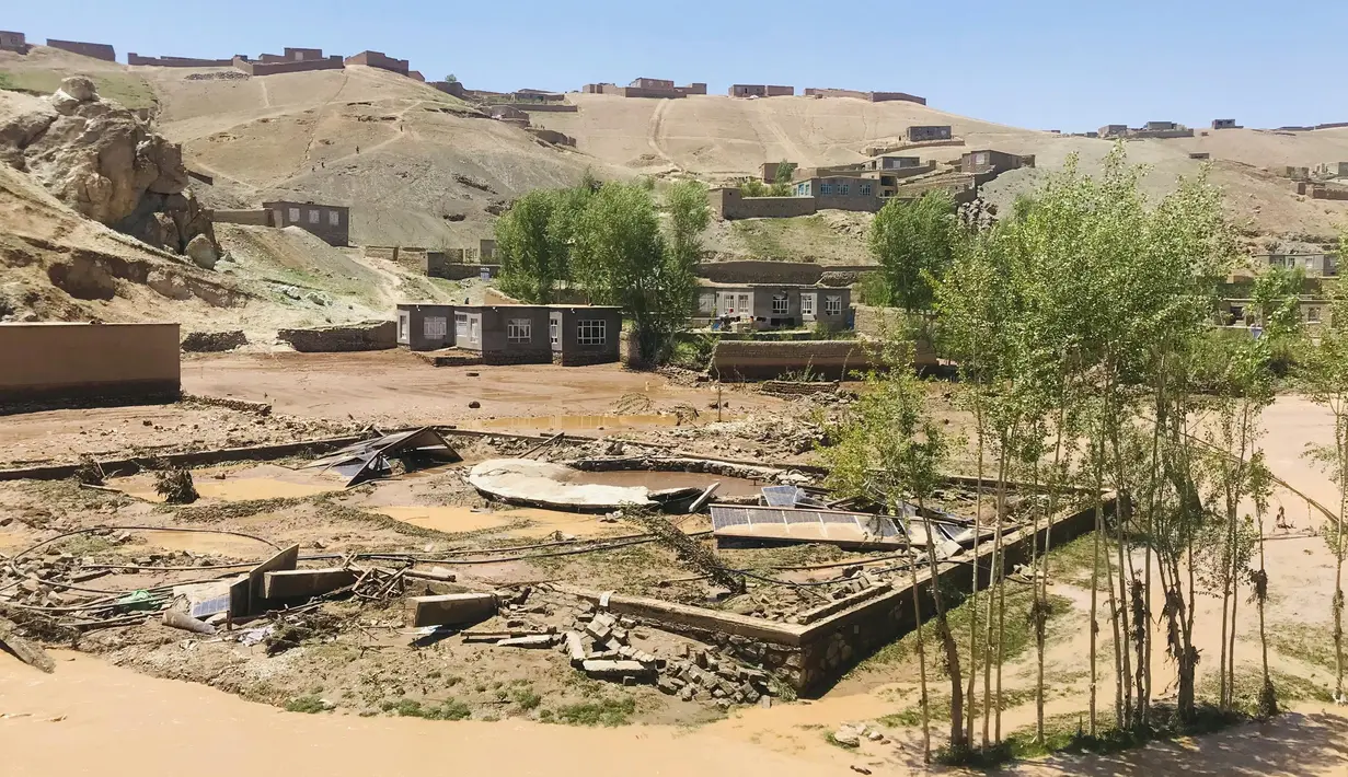 Departemen meteorologi Afghanistan mengeluarkan peringatan akan terjadi lebih banyak hujan dan kemungkinan banjir di seluruh provinsi di negara itu. (AP Photo/Omid Haqjoo)