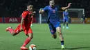 Fajar Fathur Rahman memantapkan keunggulan Indonesia menjadi 4-2 pada masa extra time. (Photo by MOHD RASFAN / AFP)