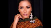 Pesona Titi rajo Bintang di dunia hiburan memang sudah tak lagi diragukan. Memiliki tubuh tinggi dan juga kulit eksotis, Titi Rajo Bintang jadi idola masyarkaat Tanah Air. (Liputan6.com/IG/@titiradjopadmaja)