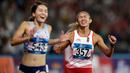 Pelari Indonesia, Emilia Nova, melakukan selebrasi usai berlaga pada nomor 100 meter lari gawang Asian Games di SUGBK, Jakarta, Minggu (26/8/2018). Emilia Nova menyabet medali perak setelah membukukan waktu 13,33 detik. (Bola.com/Peksi Cahyo)