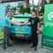Green SM sebagai penyedia armada taksi listrik jalin kerja sama dengan Gojek.