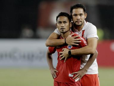 Ramdani Lestaluhu resmi tinggalkan Persija Jakarta pada Januari 2022. Kiper utama Macan Kemayoran Andritany Ardhiyasa menjadi salah satu pemain yang paling merasakan kehilangan, (Bola.com/M Iqbal Ichsan)