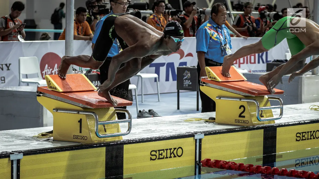 Perenang Indonesia, Triady Fauzi Sidiq, meraih emas renang nomor 200 meter gaya ganti SEA Games. (Liputan6.com/Faizal Fanani)