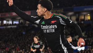 Pemain Arsenal Ethan Nwaneri saat mencetak gol ke gawang Brighton pada ajang Liga Inggris 2024/2025. (Glyn KIRK / AFP)