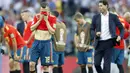 Jordi Alba menutup wajahnya setelah timnya kalah dari Rusia pada laga 16 besar Piala Dunia 2018 di Luzhniki Stadium, Moskow, Rusia, (1/7/2018). Spanyol kalah adu penalti 3-4. (AP/Antonio Calanni)