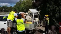 Muslim Ahmadiyah bantu korban banjir di Queensland, Australia. (Twitter/Ahmadi Muslims Logan)