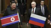 Kedua kepala negara itu akan membahas hubungan perdagangan, keamanan, serta mendukung Korea Utara melawan AS.  (Gavriil Grigorov, Sputnik, Kremlin Pool Photo via AP)