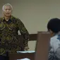 Terdakwa suap perizinan dan pengadaan proyek di lingkungan Ditjen Hubla TA 2016-2017 Antonius Tonny Budiono saat sidang di Pengadilan Tipikor, Jakarta, Rabu (28/3). Sidang mendengar keterangan Menhub, Budi Karya Sumadi. (Liputan6.com/Helmi Fithriansyah)