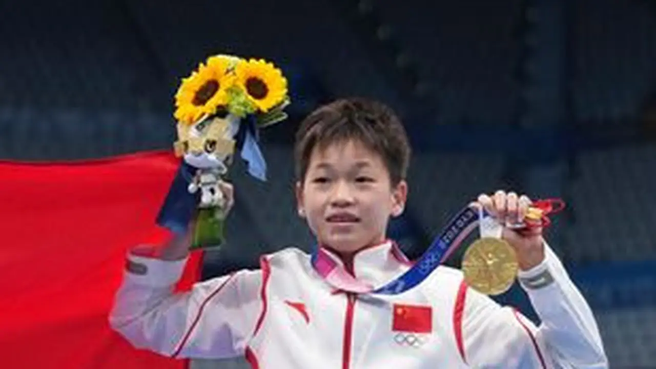 Keluarga Quan Hongchan telah menolak properti dan uang tunai gratis setelah kesuksesan Olimpiadenya ( Gambar: Layanan Berita China melalui Getty Images)