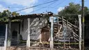 Foto menunjukkan kondisi rumah yang rusak setelah guncangan gempa bumi berkekuatan 6,5 magnitudo di komunitas San Marcos, negara bagian Guerrero, Meksiko pada Jumat 2 Januari 2026. Gempa bumi berkekuatan 6,5 magnitudo yang mengguncang Mexico City, Jumat (2/1/2026) waktu setempat. (Francisco ROBLES/AFP)