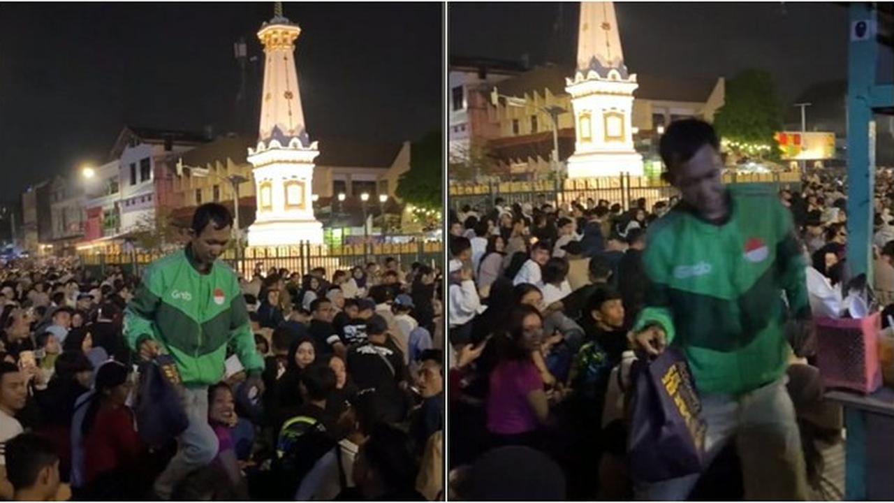 Driver Ojol Ini Tetap Antar Pesanan di Tengah Lautan Manusia saat Malam Tahun Baru di Jogja