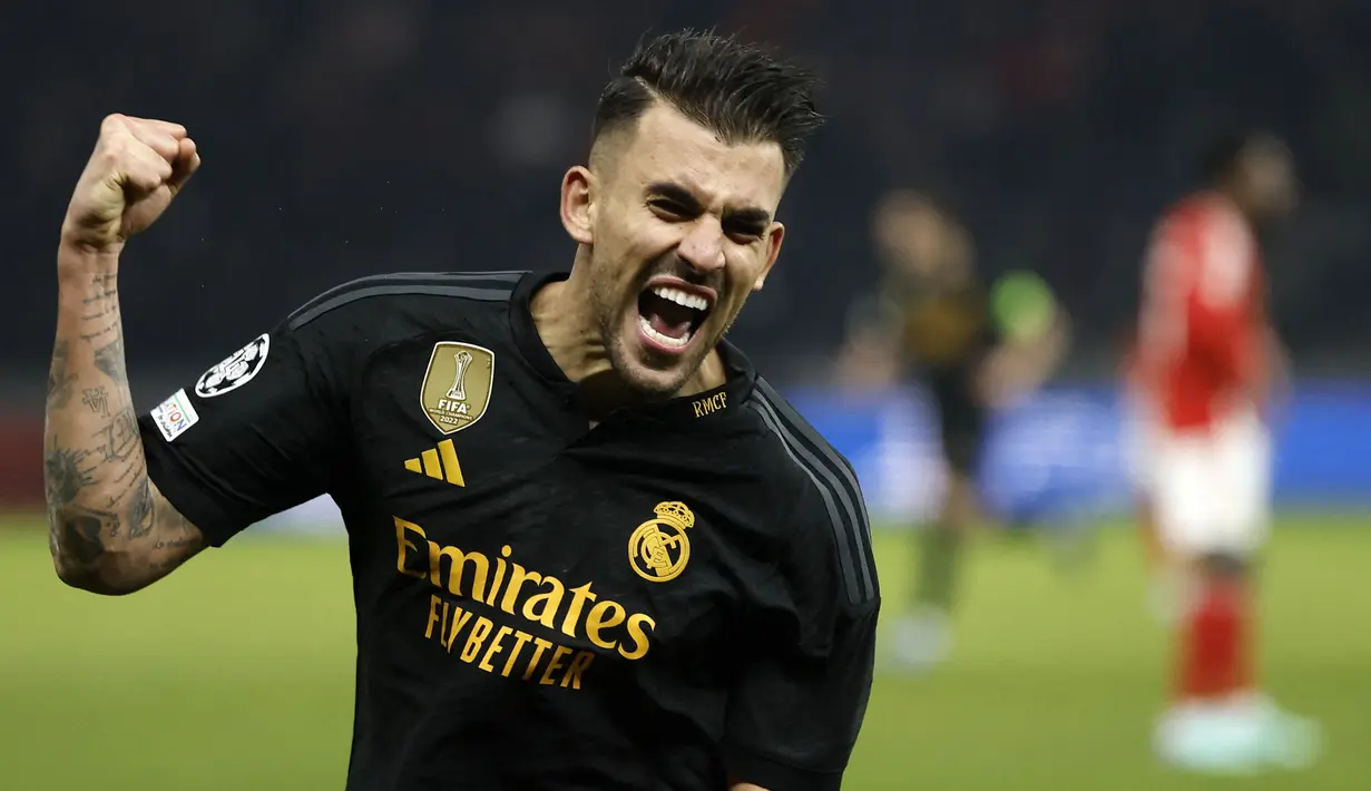 Pemain Real Madrid, Dani Ceballos melakukan selebrasi setelah mencetak gol kemenangan timnya ke gawang Union Berlin pada laga lanjutan Grup C Liga Champions 2023/2024 di Olympiastadion, Berlin, Jerman, Rabu (13/12/2023) dini hari WIB. (AFP/Odd Andersen)