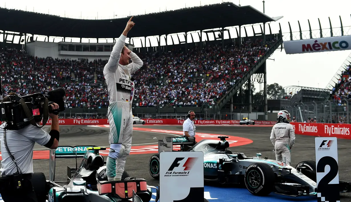 Ekspresi Nico Rosberg setelah finis pertama F1 GP Meksiko di Sirkuit Autodromo Hermanos Rodriguez, Senin (2/11/2015) dini hari WIB. (Getty Images/AFP/Lars Baron)