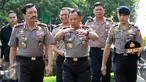  Kepala BIN Jendral Budi Gunawan dan Kapolri Jendral Tito Karnavian berjalan menuju Auditorium PTIK, Jakarta, Rabu (14/9). Polri melakukan tradisi penghantaran tugas Budi Gunawan sebagai Kepala BIN. (Liputan6.com/Helmi Afandi)