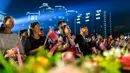 Orang-orang menghadiri acara perayaan Hari Ulang Tahun ke-74 Korea Utara di Kim Il Sung Square, Pyongyang, Korea Utara, 9 September 2022. (KIM Won Jin/AFP)