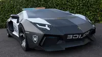 Taras Lesko, desainer visual asal Seattle berhasil menciptakan Lamborghini seukuran aslinya hanya dari kertas dan kardus. (Foto: Odditycentral)
