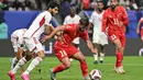 Laga kedua timnas ini berakhir imbang 1-1. (HECTOR RETAMAL/AFP)
