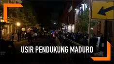 Pihak kepolisian menyerahkan surat pemberitahuan pengusiran kepada aktivis Pro-Maduro. Para aktivis tersebut telah menetap selama sebulan di Kedutaan Besar Venezuela di Washington.