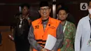 Wali Kota Madiun nonaktif, Maidi, berjalan keluar meninggalkan Gedung Merah Putih Komisi Pemberantasan Korupsi (KPK) usai menjalani pemeriksaan lanjutan, Jakarta, Kamis (23/4/2026). (Liputan6.com/Helmi Fithriansyah)