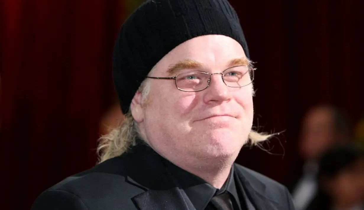 Philip Seymour Hoffman ditemukan tewas di kamar hotel karena overdosis heroin pada 2 Februari 2014. Saat itu ia tengah dis ibukkan syuting The Hunger Games: Mockingjay.(FRAZER HARRISON / GETTY IMAGES NORTH AMERICA / AFP)