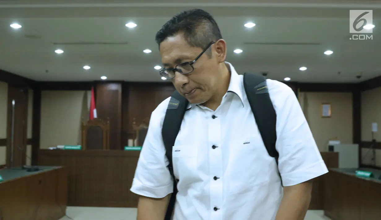 Terpidana kasus korupsi Pembangunan P3SON Hambalang, Anas Urbaningrum usai menjalani sidang lanjutan PK di Pengadilan Negeri Jakarta Pusat, Kamis (12/7). Sidang beragenda pembacaan kesimpulan pemohon Peninjauan Kembali. (Liputan6.com/Helmi Fithriansyah)