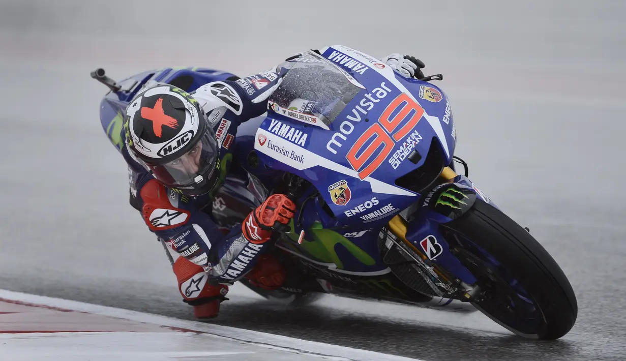 Di bawah hujan deras Jorge Lorenzo mencoba Circuit of the Americas (COTA), Austin, Amerika Serikat. (AP Photo/Tony Gutierrez)