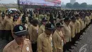 Sebanyak lebih kurang 4000 orang mengikuti Upacara Hari Kesehatan Nasional ke-50 di Lapangan Silang Monas, Jakarta, Rabu (12/11/14) (Liputan6.com/Herman Zakharia)