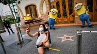 Universal Studio Singapura membuka kembali pintu mereka bagi pengunjung di masa pandemi dengan sederet aturan baru. (dok. Instagram @rwsentosa/https://www.instagram.com/p/CCUerD2gZ29/)