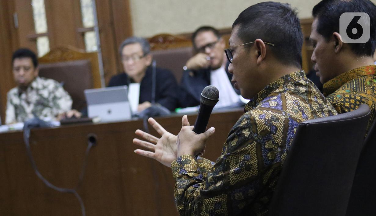 Mantan Menteri Agama, Lukman Hakim Saifuddin saat menjadi saksi pada sidang lanjutan dugaan suap jual-beli jabatan di lingkungan Kemenag dengan terdakwa M Romahurmuziy di Pengadilan Tipikor Jakarta, Rabu (4/12/2019). Sidang beragenda mendengar keterangan saksi. (Liputan6.com/Helmi Fithriansyah)