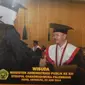 Warga bernama Saiton diwisuda di Palembang, Sumatera Selatan. (Liputan6.com/Nefri Inge)