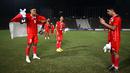Sejumlah pemain Timnas Indonesia U-22 merayakan kemenangan pada laga final sepak bola SEA Games 2023 melawan Thailand di Olympic Stadium, Phnom Penh, Kamboja, Selasa (16/05/2023). Skuad Garuda Nusantara menang dengan skor 5-2. (AFP/Mohd Rasfan)