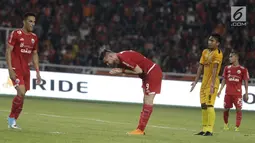 Ekspresi pemain depan Persija, Marco Simic (dua kiri) saat bertanding melawan Bhayangkara FC pada laga pembuka Liga 1 2018 di SUGBK, Jakarta, Jumat (23/3). Pertandingan berakhir dengan skor kacamata. (Bola.com/Teguh Iman Mulia)