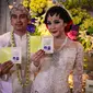 Jumat (17/10/14), Raffi Ahmad dan Nagita Slavina sah menjadi pasangan suami-istri, Jakarta. (Liputan6.com/Faizal Fanani) 