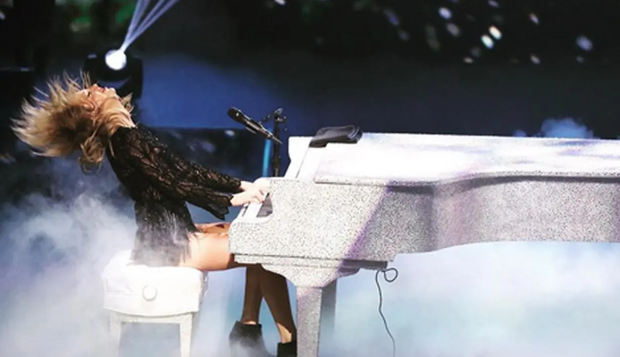 Taylor Swift, belakangan ini memang jarang terlihat tampil di publik. Sempat dipertanyakan keberadaannya, namun baru-baru ini ia mengungkap pertanyaan besar yang selama ini diperbincangkan. (AFP/Bintang.com)