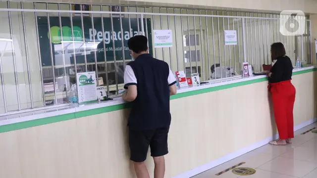FOTO: Bisnis Gadai Melambung di Tengah Pandemi Covid-19