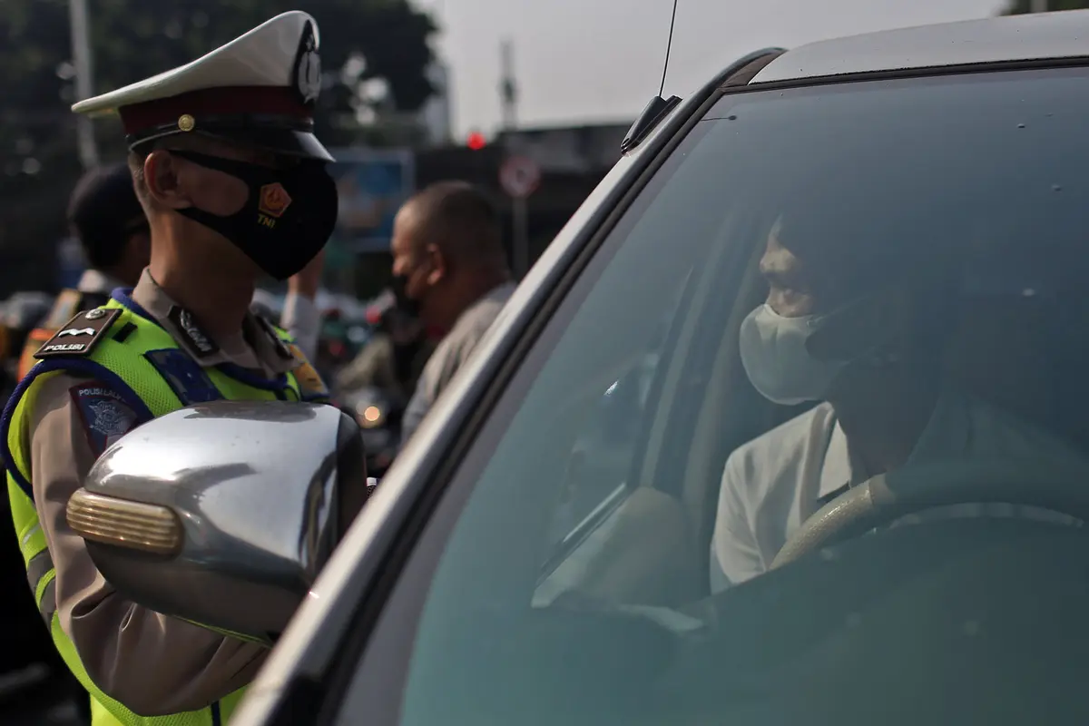 FOTO: PPKM Level 2, Sistem Ganjil Genap di Jakarta Diperluas