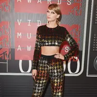 Saat persidangan berlangsung, Taylor sempat kesal dengan kuasa hukum David yang menyatakan kalimat penutup  padahal persidangan belum usai. Namun setelah itu ia tersenyum lega dengan keputusan akhir. (AFP/Jason Merritt)