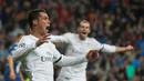Cristiano Ronaldo mencetak hat-trick untuk membawa Real Madrid menang 3-0 atas VfL Wolfsburg pada leg kedua perempat final Liga Champions di Stadion Santiago Bernabeu, Madrid, Rabu (13/4/2016) dini hari WIB. (AFP/Curto De La Torre)