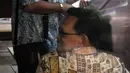 Brigjen Polisi Didik Purnomo diperiksa sebagai tersangka dalam kasus dugaan korupsi simulator SIM di Korlantas Polri, Jakarta, Selasa (26/8/2014) (Liputan6.com/Miftahul Hayat)