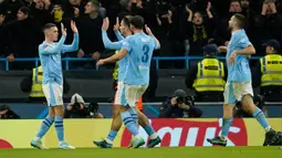 Manchester City jadi tim pertama yang lolos ke babak 16 besar Liga Champions usai menang 3-0 atas Young Boys. (AP Photo/Dave Thompson)